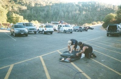 Rolling up the raft.