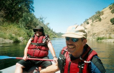 John and Jeff laugh at the approaching rapids.