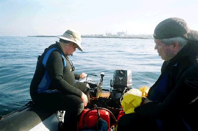 John shocks the outboard motor back to life.