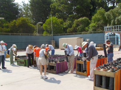 The Pyro crew cleans out the mortars from last use.