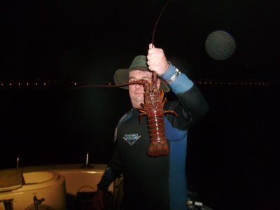 I pose with my catch of the night - a REALLY expensive lobster... That's right, hold it as close to the camera as possible to try and make it look bigger.