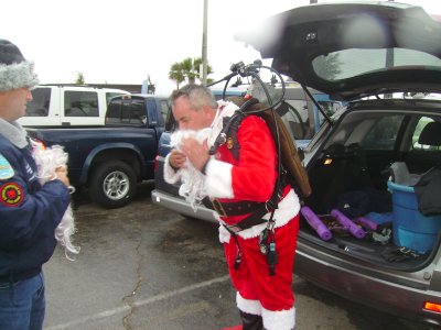 Dan suits up to be Santa Claus.