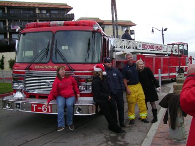 The Fire Department stops to pick up the donated toys.
