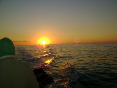 The sunset from the Mr. C, pulling in to the harbor.