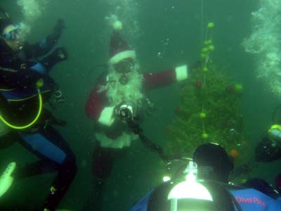Divers pose with Santa.