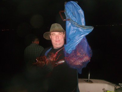 A macho diver with his lobsters