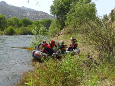 The raft shoves off for the fourth run.