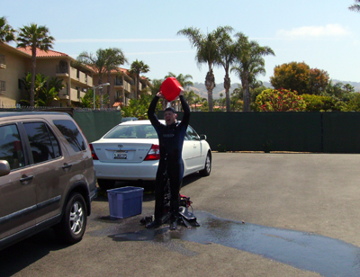 A suicidal diver pours gasoline over himself.