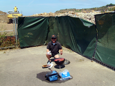 Ed mans the barbecue.